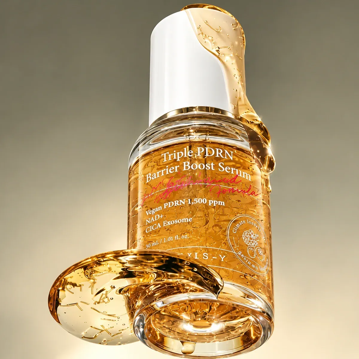 Axis-Y Triple PDRN Barrier Boost Serum — флакон із золотистою сироваткою і золотими нитками
