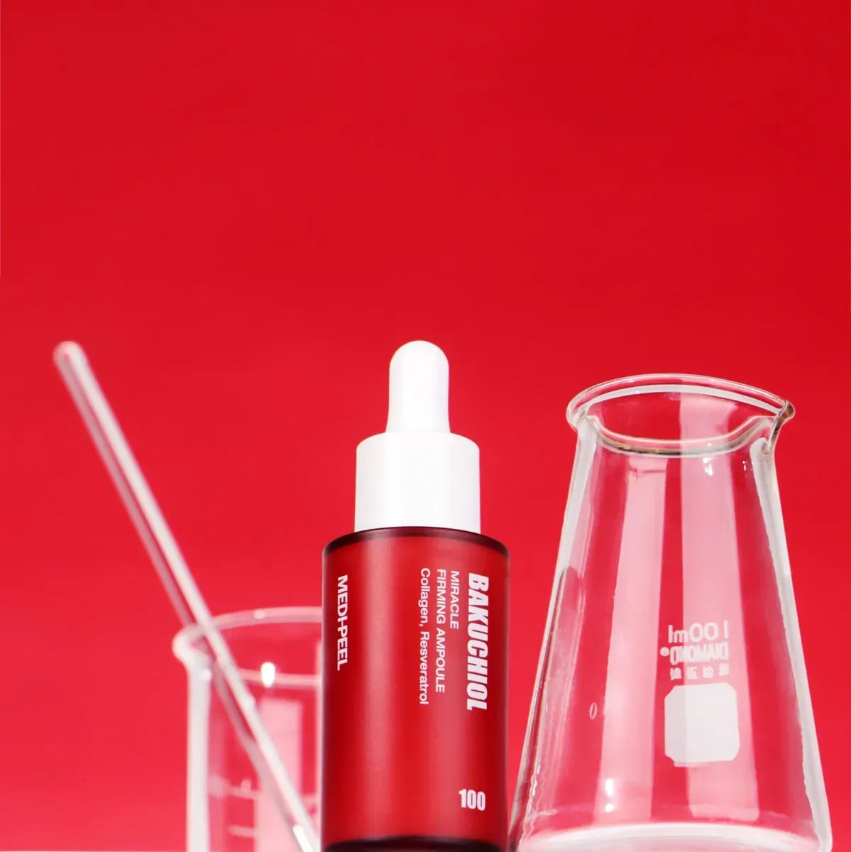 Medi-Peel Bakuchiol Miracle Firming Ampoule — флакон з піпеткою на червоному тлі